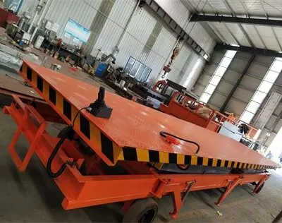 剪(jian)叉式(shi)裝卸(xie)貨升(sheng)降平(ping)台